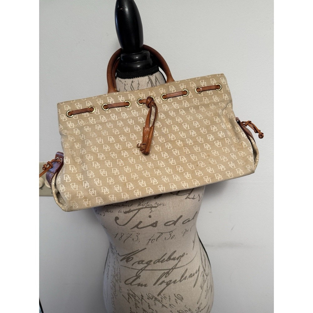 Dooney and Bourke  Beige Canvas and Leather Signature‎ Tassel Tote Handbag